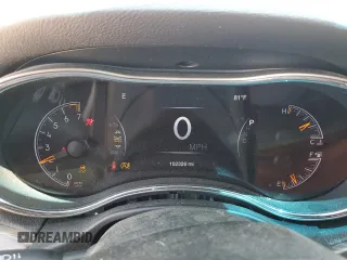 2017 Jeep Grand Cherokee Laredo with VIN 1C4RJEAG0HC816410, listed as a Copart auction lot 52909905 with 102,326 mi miles and Salvage title. Bid and sale history available at DreamBid. Image 9.
