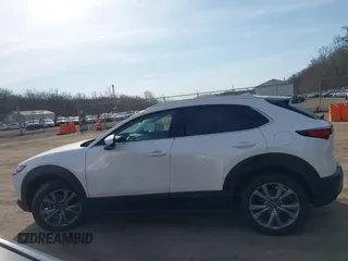 2022 Mazda CX-30 S Premium with VIN 3MVDMBDL7NM412263, listed as a IAAI auction lot 41779877 with 42,088 mi miles and . Bid and sale history available at carsss.com. Image 13.
