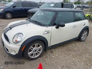 2013 MINI Hardtop S with VIN WMWSV3C54DT394199, listed as a IAAI auction lot 42163715 with 146,548 mi miles and . Bid and sale history available at DreamBid. Image 2.
