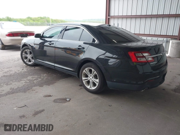 2015 Ford Taurus SEL z VIN 1FAHP2E86FG165100, wystawiony jako IAAI lot #42157272 z przebiegiem 141 846 mil mil oraz . Historia ofert i sprzedaży dostępna na DreamBid. Obrazek 3.