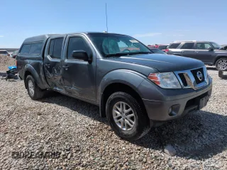 2016 Nissan Frontier SV with VIN 1N6AD0FV5GN780728, listed as a Copart auction lot 59890745 with 135,059 mi miles and Salvage title. Bid and sale history available at DreamBid. Image 4.