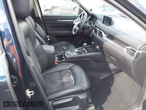 2018 Mazda CX-5 Touring with VIN JM3KFBCM5J0369799, listed as a IAAI auction lot 41895364 with 76,801 mi miles and . Bid and sale history available at carsss.com. Image 5.