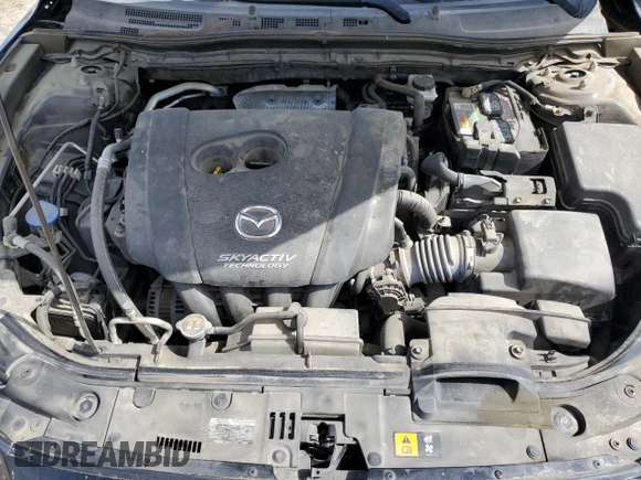 2018 Mazda 3 Touring z VIN 3MZBN1V3XJM268911, wystawiony jako Copart lot #51731825 z przebiegiem 151 921 mil mil oraz Szkoda całkowita • Salvage title. Historia ofert i sprzedaży dostępna na DreamBid. Obrazek 12.
