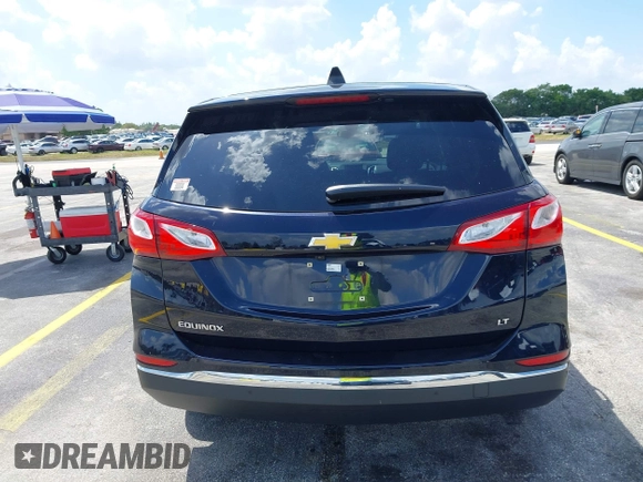 2020 Chevrolet Equinox LT with VIN 3GNAXJEV5LS592266, listed as a IAAI auction lot 41924328 with 61,574 mi miles and . Bid and sale history available at DreamBid. Image 16.