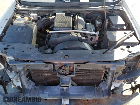 2003 GMC Envoy SLT z VIN 1GKET16S736179347, wystawiony jako Copart lot #52370775 z przebiegiem 230 623 mil mil oraz Szkoda całkowita • Salvage title. Historia ofert i sprzedaży dostępna na DreamBid. Obrazek 14.