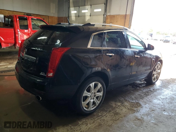 2014 Cadillac SRX Performance Collection z VIN 3GYFNFE31ES627978, wystawiony jako Copart lot #55437185 z przebiegiem 141 759 mil mil oraz Czysty tytuł • Clean title. Historia ofert i sprzedaży dostępna na DreamBid. Obrazek 3.