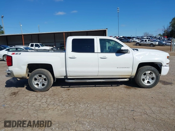 2018 Chevrolet Silverado 1500 LT with VIN 3GCUKREC3JG504431, listed as a IAAI auction lot 41609921 with 192,742 mi miles. Bid and sale history available at carsss.com. Image 13.