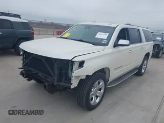 2015 Chevrolet Suburban LTZ with VIN 1GNSCKKC7FR641421, listed as a IAAI auction lot 41637137 with 139,001 mi miles and . Bid and sale history available at DreamBid. Image 6.