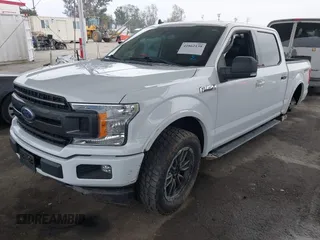 2019 Ford F-150 XL with VIN 1FTEW1CPXKKC50999, listed as a IAAI auction lot 41862139 with 61,375 mi miles and . Bid and sale history available at DreamBid. Image 2.