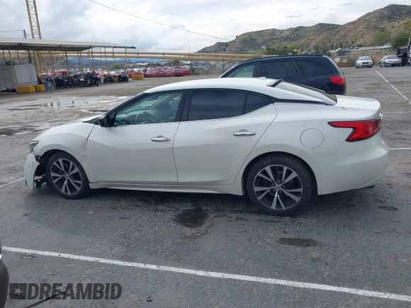 2016 Nissan Maxima SR with VIN 1N4AA6AP4GC449440, listed as a IAAI auction lot 41756271 with 136,685 mi miles and . Bid and sale history available at DreamBid. Image 14.