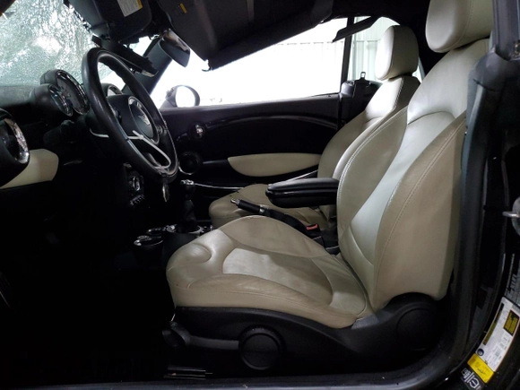 2013 MINI Convertible S with VIN WMWZP3C51DT297891, listed as a Copart auction lot 56745065 with 101,292 mi miles and Salvage title. Bid and sale history available at DreamBid. Image 7.