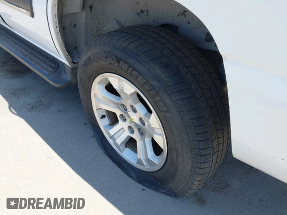 2003 Chevrolet Tahoe LS with VIN 1GNEC13V73R265144, listed as a IAAI auction lot 42464386 with 238,249 mi miles and . Bid and sale history available at DreamBid. Image 6.