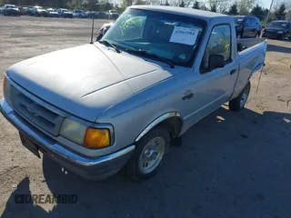 1996 Ford Ranger XL with VIN 1FTCR10A8TTA22056, listed as a IAAI auction lot 42062984 with 215,030 mi miles and . Bid and sale history available at DreamBid. Image 2.