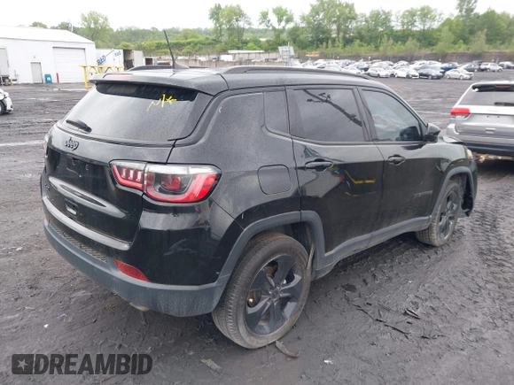 2021 Jeep Compass Latitude with VIN 3C4NJDBB6MT590092, listed as a IAAI auction lot 42351097 with 72,428 mi miles and . Bid and sale history available at DreamBid. Image 4.