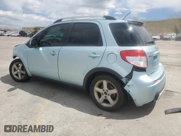 2009 Suzuki SX4 Touring AWD z VIN JS2YB417396203092, wystawiony jako Copart lot #53965685 z przebiegiem 153 701 mil mil oraz Szkoda całkowita • Salvage title. Historia ofert i sprzedaży dostępna na DreamBid. Obrazek 2.