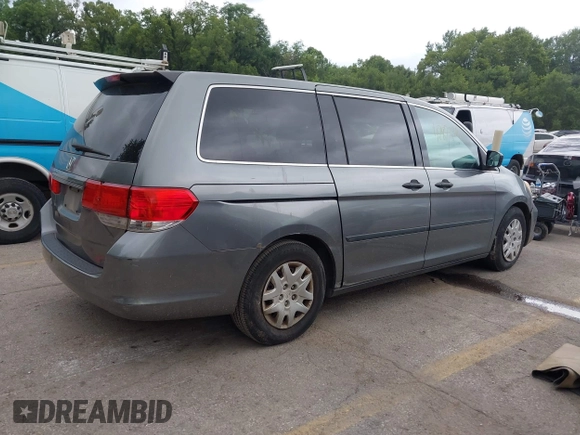 2009 Honda Odyssey LX with VIN 5FNRL38269B043326, listed as a IAAI auction lot 42872714 with 235,087 mi miles and . Bid and sale history available at DreamBid. Image 4.