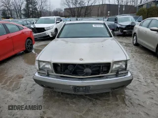 1988 Mercedes-Benz 560 with VIN WDBCA45D9JA411517, listed as a Copart auction lot 46978105 with 298,725 mi miles and Clean Title. Bid and sale history available at DreamBid. Image 5.