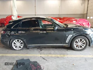 2016 Infiniti QX70 z VIN JN8CS1MW7GM400558, wystawiony jako IAAI lot #40917829 z przebiegiem 149 885 mil mil oraz . Historia ofert i sprzedaży dostępna na DreamBid. Obrazek 13.