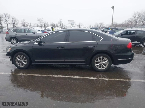 2016 Volkswagen Passat 1.8T S with VIN 1VWAT7A3XGC010246, listed as a IAAI auction lot 41568054 with 100,399 mi miles. Bid and sale history available at carsss.com. Image 14.