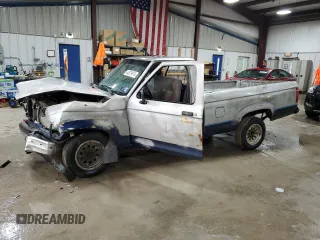 1990 Ford Ranger XL with VIN 1FTCR10A2LPB27457, listed as a Copart auction lot 66062944 with 291,742 mi miles and Salvage title. Bid and sale history available at DreamBid. Image 1.