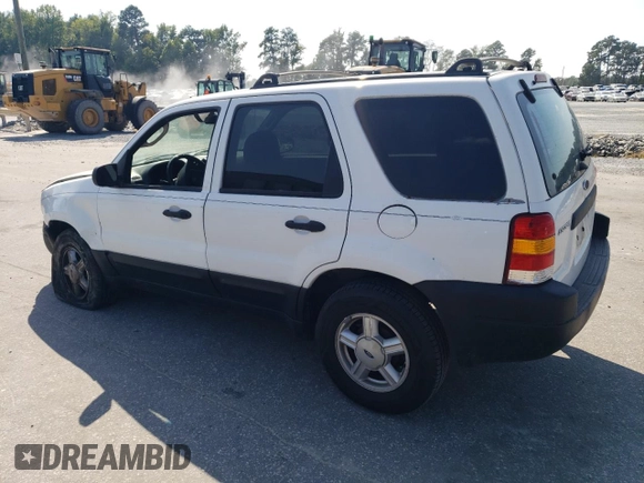 2004 Ford Escape XLS with VIN 1FMYU021X4DA07352, listed as a Copart auction lot 68909864 with 275,776 mi miles and Salvage Title. Bid and sale history available at DreamBid. Image 2.