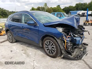 2022 Ford Escape Titanium Plug-In Hybrid with VIN 1FMCU0LZXNUA86733, listed as a Copart auction lot 70431164 with 29,311 mi miles and Salvage title. Bid and sale history available at DreamBid. Image 4.