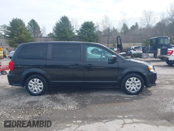 2017 Dodge Grand Caravan SE z VIN 2C4RDGBG3HR687183, wystawiony jako IAAI lot #41971615 z przebiegiem 158 201 mil mil oraz . Historia ofert i sprzedaży dostępna na DreamBid. Obrazek 13.