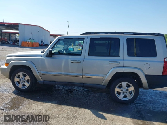 2007 Jeep Commander Sport z VIN 1J8HG48K07C559271, wystawiony jako IAAI lot #42032853 z przebiegiem 236 443 mil mil oraz . Historia ofert i sprzedaży dostępna na DreamBid. Obrazek 14.