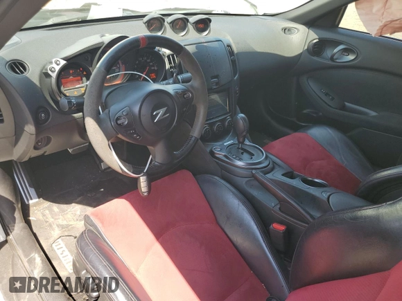 2015 Nissan 370Z Nismo z VIN JN1AZ4EH3FM441254, wystawiony jako Copart lot #52646145 z przebiegiem 74 303 mil mil oraz Szkoda całkowita • Salvage title. Historia ofert i sprzedaży dostępna na DreamBid. Obrazek 8.