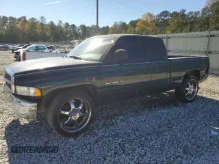 1999 Dodge 1500 with VIN 3B7HC13Y4XG240711, listed as a Copart auction lot 80141094 with 239,956 mi miles and Salvage Title. Bid and sale history available at DreamBid. Image 1.