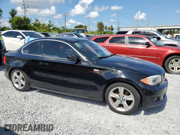 2012 BMW 1 Series 128i with VIN WBAUP7C56CVP23806, listed as a Copart auction lot 62339235 with 105,776 mi miles and Salvage title. Bid and sale history available at DreamBid. Image 4.