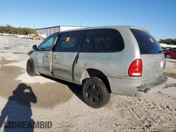 1999 Plymouth Voyager Grand SE z VIN 1P4GP44G1XB579504, wystawiony jako Copart lot #50064475 z przebiegiem Nie podano mil oraz Nie do naprawy. Historia ofert i sprzedaży dostępna na DreamBid. Obrazek 2.