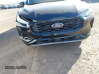 2024 Ford Escape ST-Line with VIN 1FMCU0MN1RUA12893, listed as a IAAI auction lot 42099878 with 26,414 mi miles and . Bid and sale history available at DreamBid. Image 6.