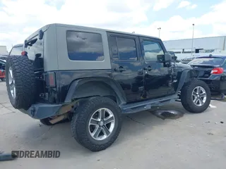 2008 Jeep Wrangler Unlimited Sahara with VIN 1J4GB59198L619802, listed as a IAAI auction lot 42361793 with 272,295 mi miles and . Bid and sale history available at DreamBid. Image 4.