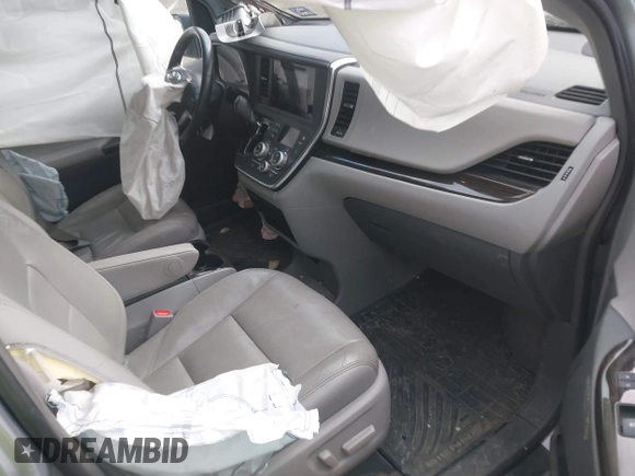 2015 Toyota Sienna Limited with VIN 5TDDK3DC6FS111465, listed as a IAAI auction lot 41698574 with 195,553 mi miles and . Bid and sale history available at DreamBid. Image 5.