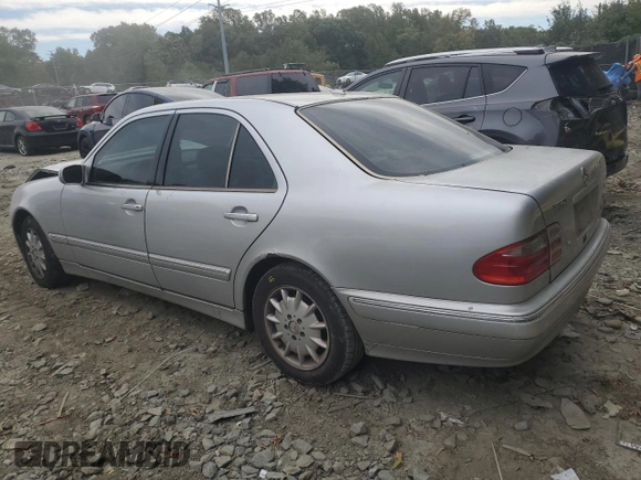 2001 Mercedes-Benz E-Class with VIN WDBJF65J71B201020, listed as a Copart auction lot 76067154 with 328,629 mi miles and Salvage Title. Bid and sale history available at carsss.com. Image 2.