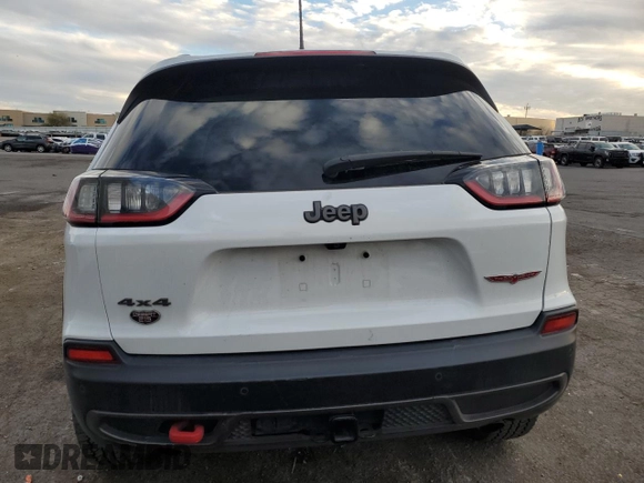 2019 Jeep Cherokee Trailhawk Elite with VIN 1C4PJMBX7KD360617, listed as a Copart auction lot 45765245 with 58,229 mi miles and Salvage Title. Bid and sale history available at carsss.com. Image 6.
