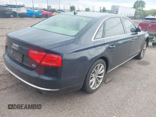 2011 Audi A8 z VIN WAURVAFD3BN019461, wystawiony jako IAAI lot #42211319 z przebiegiem 151 936 mil mil oraz . Historia ofert i sprzedaży dostępna na DreamBid. Obrazek 4.