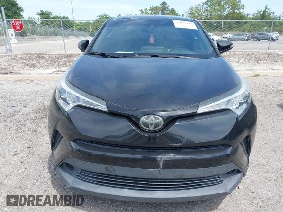 2018 Toyota C-HR XLE with VIN NMTKHMBX0JR008423, listed as a IAAI auction lot 42091445 with 124,811 mi miles. Bid and sale history available at carsss.com. Image 12.