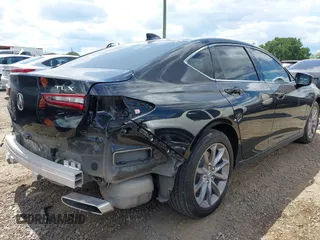 2023 Acura TLX with VIN 19UUB5F36PA002853, listed as a IAAI auction lot 42212733 with 34,432 mi miles and . Bid and sale history available at DreamBid. Image 4.