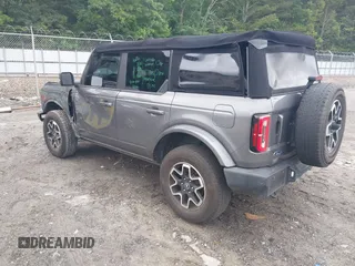 2021 Ford Bronco with VIN 1FMDE5DH9MLA62853, listed as a IAAI auction lot 42413256 with 65,000 mi miles and . Bid and sale history available at DreamBid. Image 3.