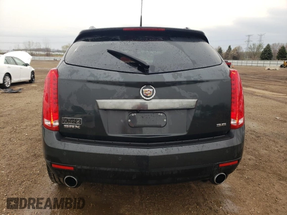 2014 Cadillac SRX Performance Collection z VIN 3GYFNCE36ES661204, wystawiony jako Copart lot #53478095 z przebiegiem 66 613 mil mil oraz Szkoda całkowita • Salvage title. Historia ofert i sprzedaży dostępna na DreamBid. Obrazek 6.
