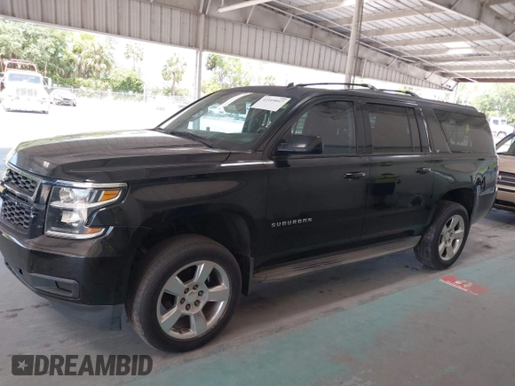 2015 Chevrolet Suburban LT with VIN 1GNSKJKC7FR199544, listed as a IAAI auction lot 42169017 with 219,219 mi miles and . Bid and sale history available at DreamBid. Image 14.