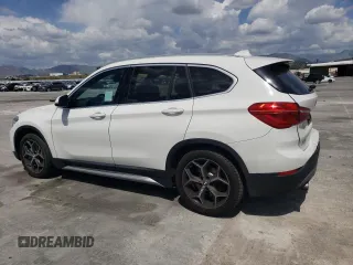 2018 BMW X1 xDrive28i with VIN WBXHT3C35J5L26952, listed as a Copart auction lot 51715035 with 63,306 mi miles and Salvage Title. Bid and sale history available at carsss.com. Image 2.