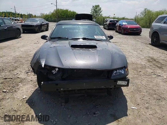 2003 Ford Mustang GT Deluxe with VIN 1FAFP45X43F387520, listed as a Copart auction lot 56302185 with 134,537 mi miles and Salvage title. Bid and sale history available at DreamBid. Image 14.