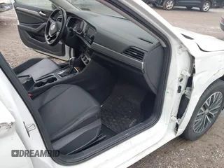 2019 Volkswagen Jetta S with VIN 3VWC57BUXKM068052, listed as a IAAI auction lot 42531029 with 65,273 mi miles and . Bid and sale history available at DreamBid. Image 5.