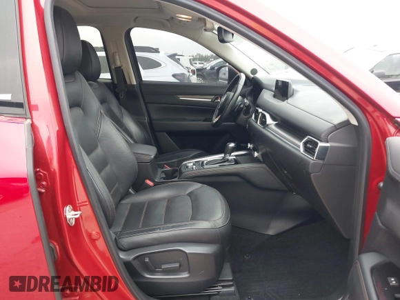 2020 Mazda CX-5 Grand Touring with VIN JM3KFADM7L0729537, listed as a IAAI auction lot 41864569 with 82,998 mi miles. Bid and sale history available at carsss.com. Image 5.
