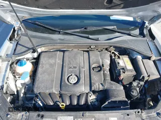 2014 Volkswagen Passat S w/Nav with VIN 1VWAP7A35EC052552, listed as a IAAI auction lot 41377109 with 123,273 mi miles. Bid and sale history available at carsss.com. Image 10.