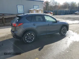 2016 Mazda CX-5 Grand Touring with VIN JM3KE4DY0G0679190, listed as a Copart auction lot 53619495 with 154,649 mi miles and Salvage Title. Bid and sale history available at carsss.com. Image 3.