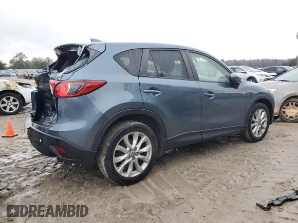 2015 Mazda CX-5 Grand Touring with VIN JM3KE2DY4F0526671, listed as a Copart auction lot 46520505 with 129,017 mi miles and Salvage Title. Bid and sale history available at carsss.com. Image 3.